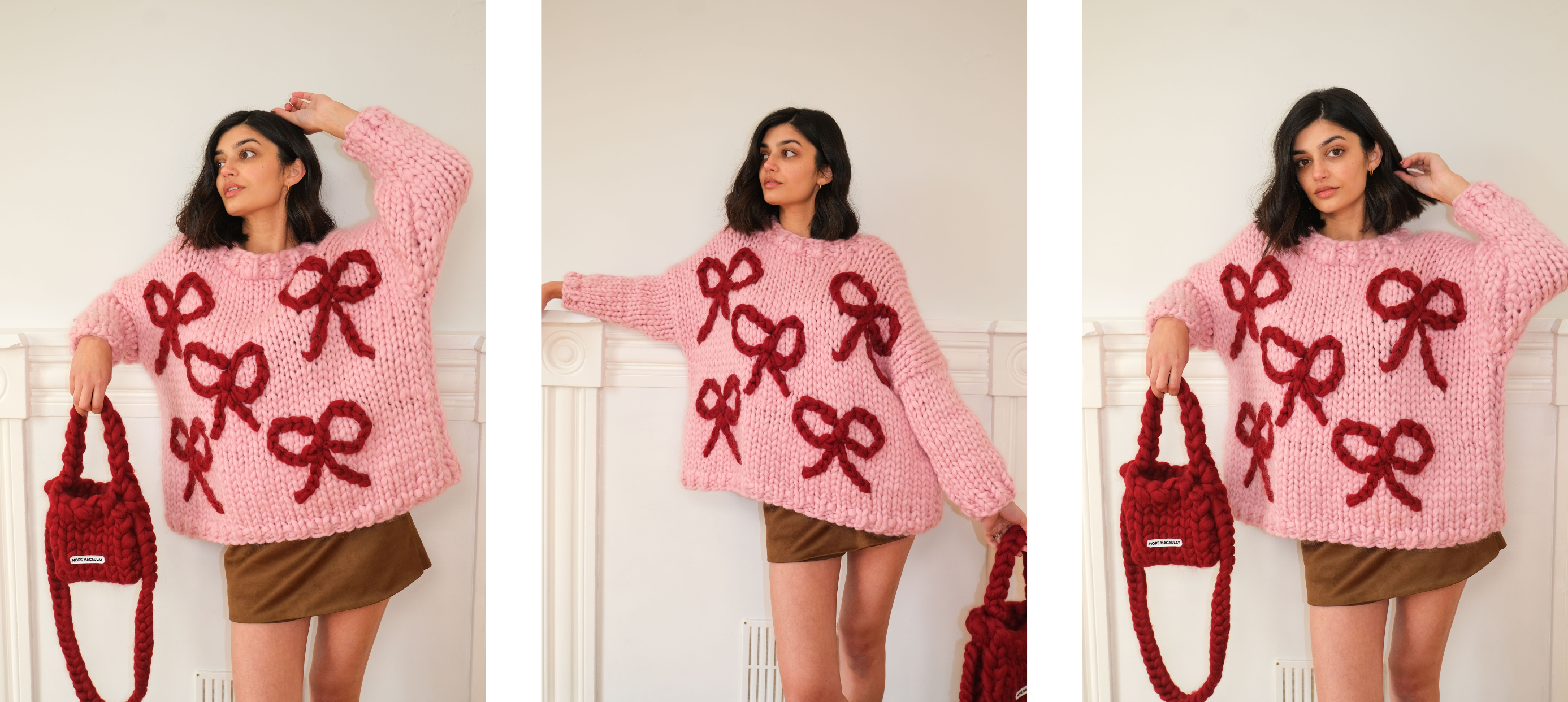 Model wearing oversized pink knitted sweater with red bows